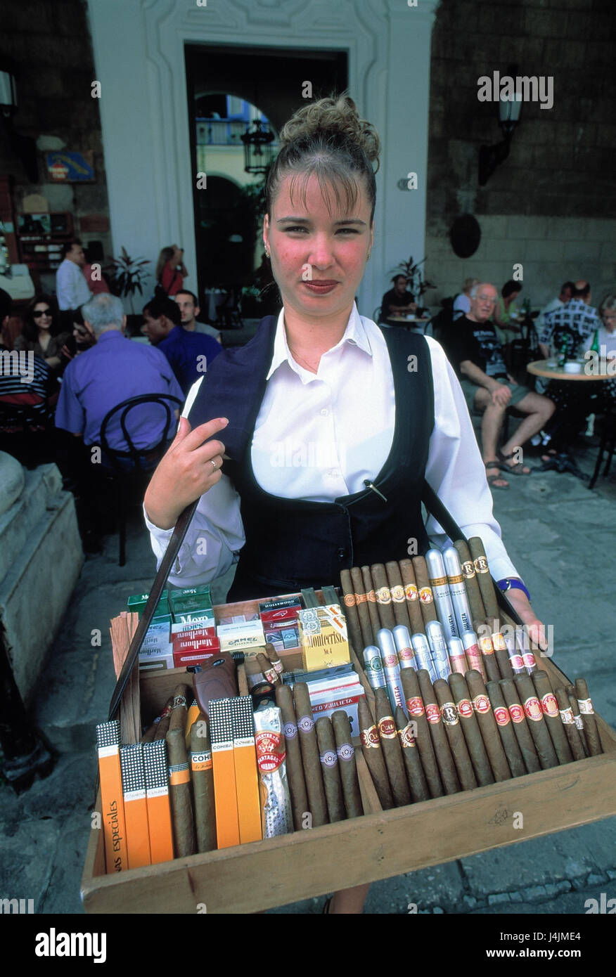 Cuba, Havana, street cafe, woman, vendor's tray, cigarettes, cigars, sales Central America, economy, sell, street sales, cigarette shop assistant, cigarette shop assistant, cigar shop assistant, cigar shop assistant, tobacco products, sorts, different, offer, choice, Havanas, outside Stock Photo