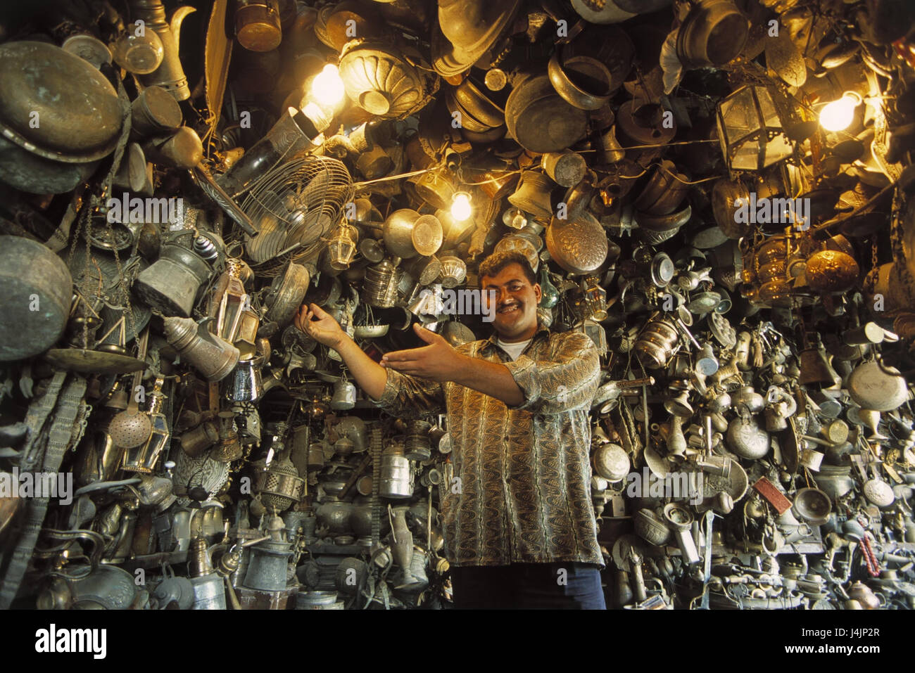 Syria, Aleppo, Old Town, Souk an-Nahhasin, copper goods, tin goods, sellers Halab, bazaar, market, smiths, copper works, copper smiths, craft, manual labour, man Stock Photo