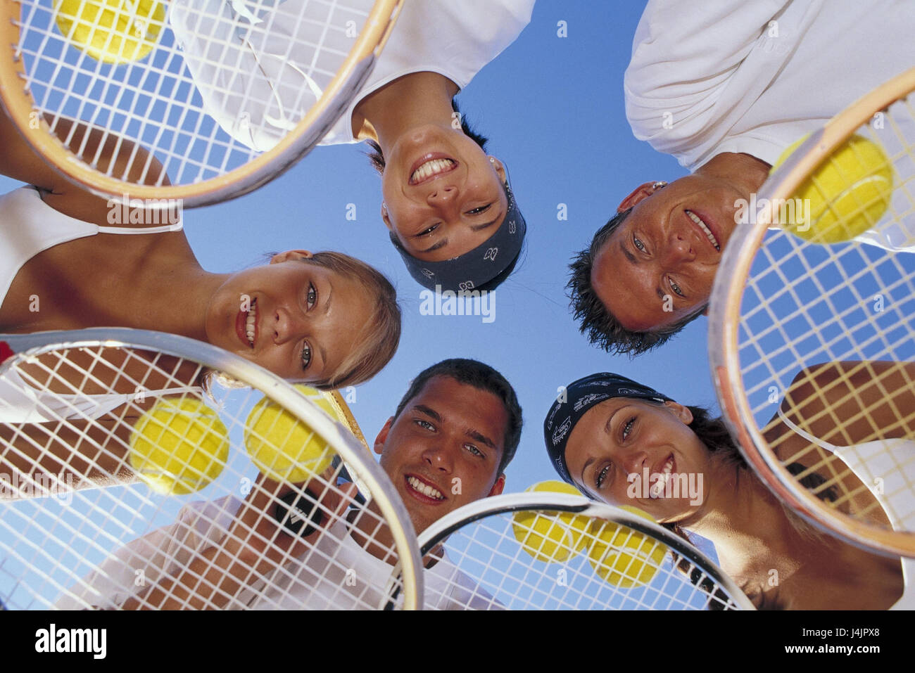 Men, women, tennis racquets, balls, circle, view camera, from below  outside, summer, leisure time, lifestyle, hobby, sport, tennis, friends,  five, sportily, tennis player, tennis players, happily, cheerfulness, smile  Stock Photo - Alamy