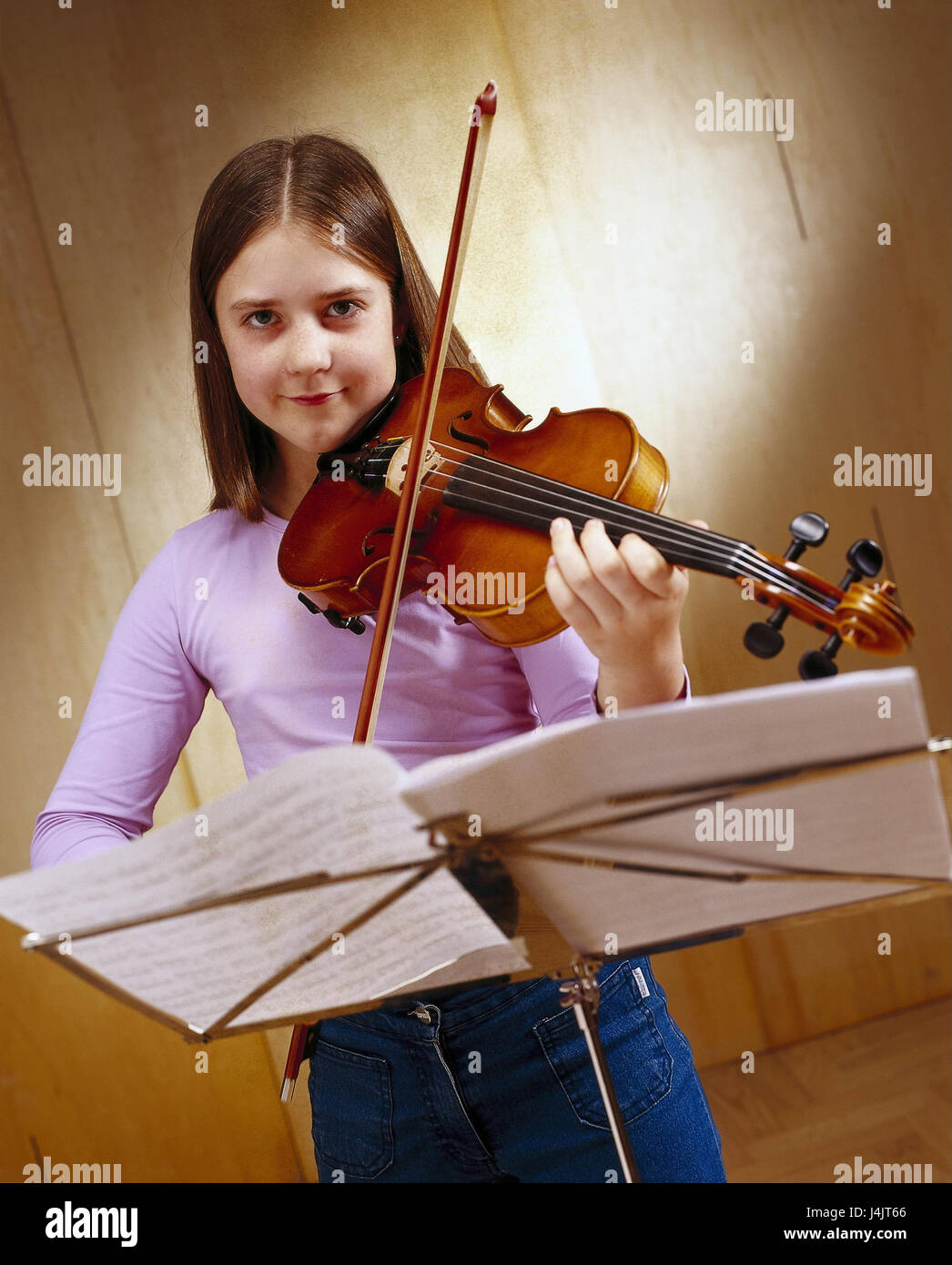 Girls, make music, practice violin, music stand inside, child, musician, music, violinist, musical instrument, violin, stringed instrument, stringed instrument, learn Stock Photo