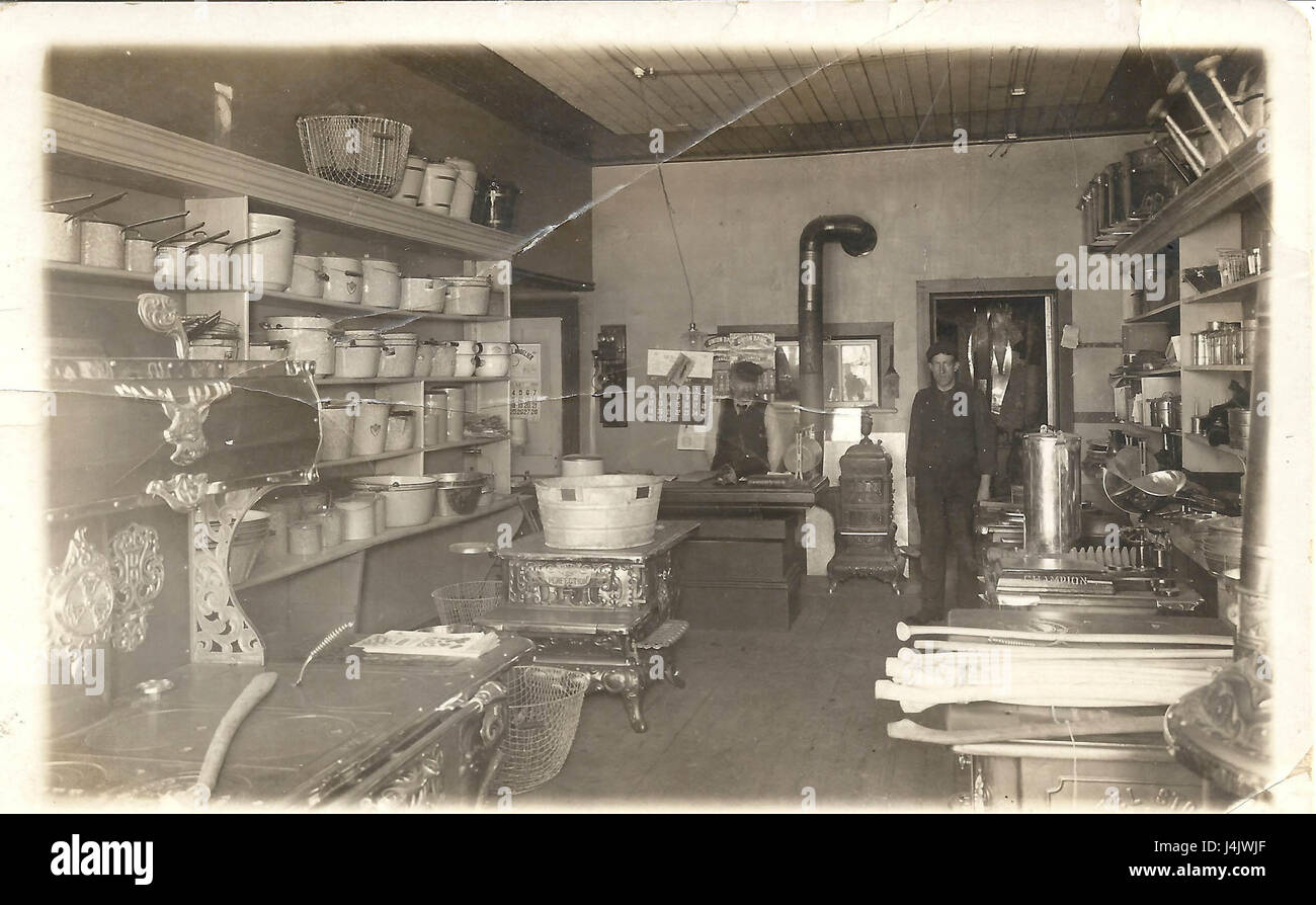 Photo-postcard showing the interior of a store selling kitchen equipment Stock Photo