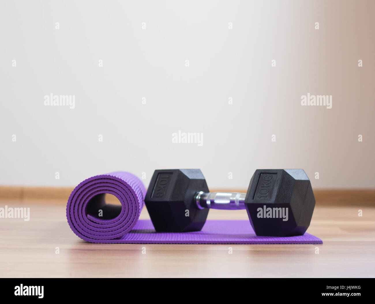 dumbbell and exercise mat Stock Photo Alamy