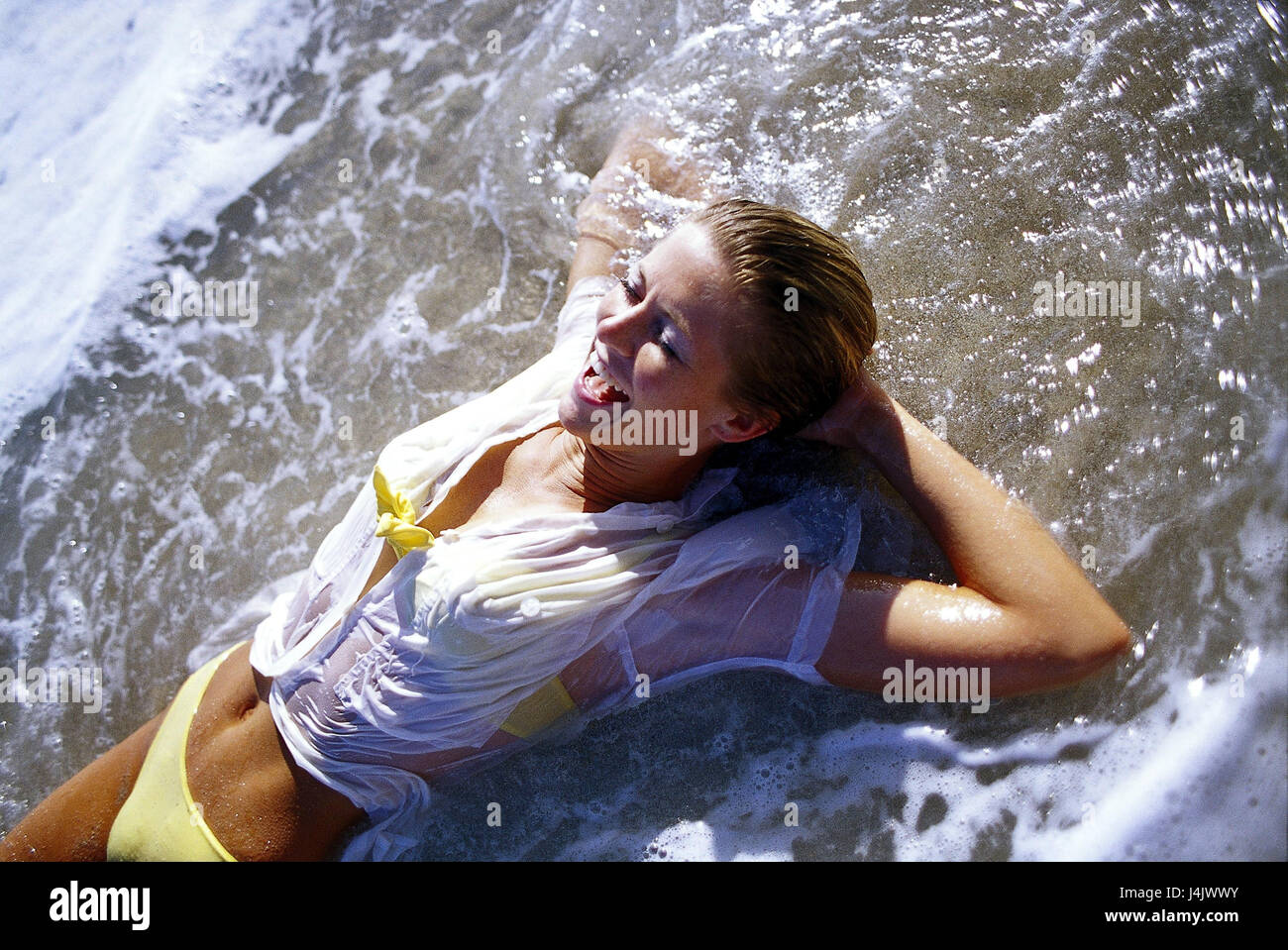 Beach, sea, woman, young, bikini, shirt, wet, are outside, sandy beach,  water, shallowly, vacation, leisure time, holidays, lifestyle, recover,  rest, are relaxing, détente, happily, smile, take it easy, pleasant  sensation, well-being, summer,