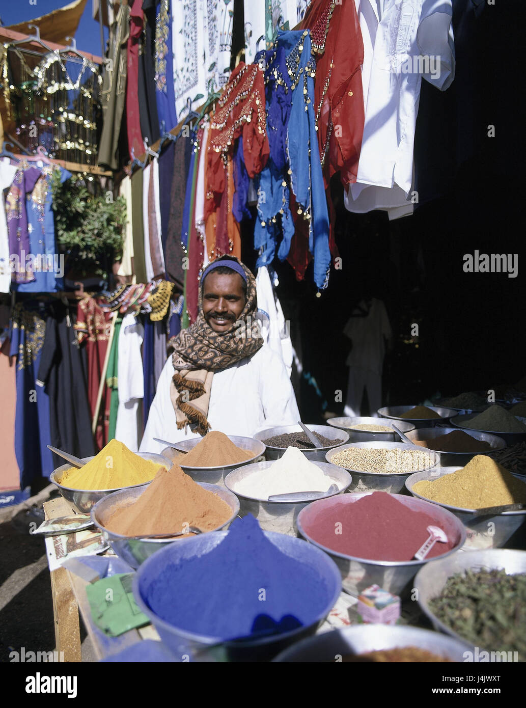 Egypt, Edfu, weekly market, spices, textiles, dealers Africa, North Africa, market, market scene, sales, trade, economy, food, colours, dye, brightly, clothes, substances, man, Egyptian, young Stock Photo