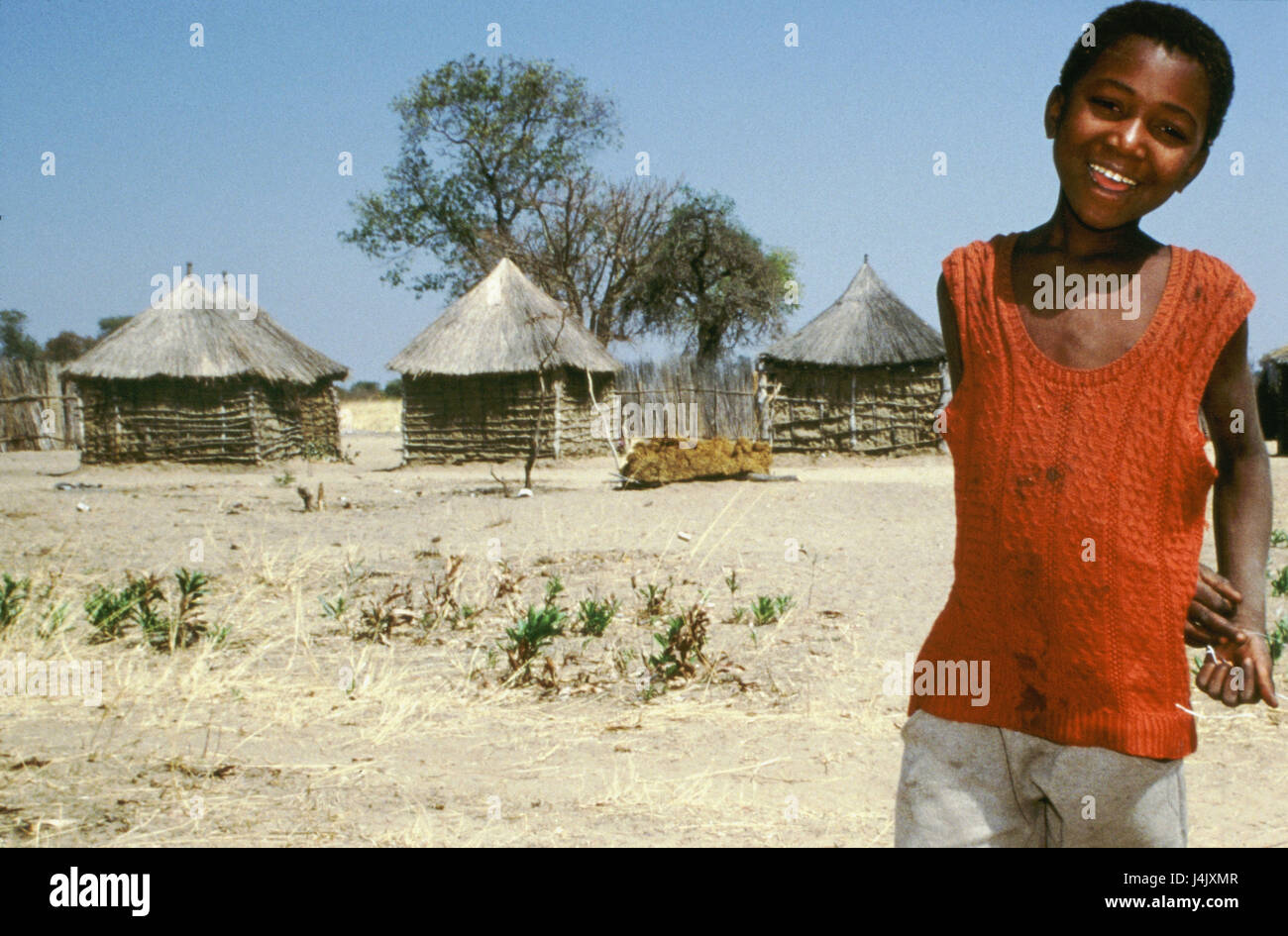 Namibia, Caprivi, village, boy, non-white, smile no model release outside, Africa, South-West Africa, Caprivi cusp, steelworks, wooden hut, houses, residential houses, residential steelworks, child, African, 9 years, happily, friendly Stock Photo
