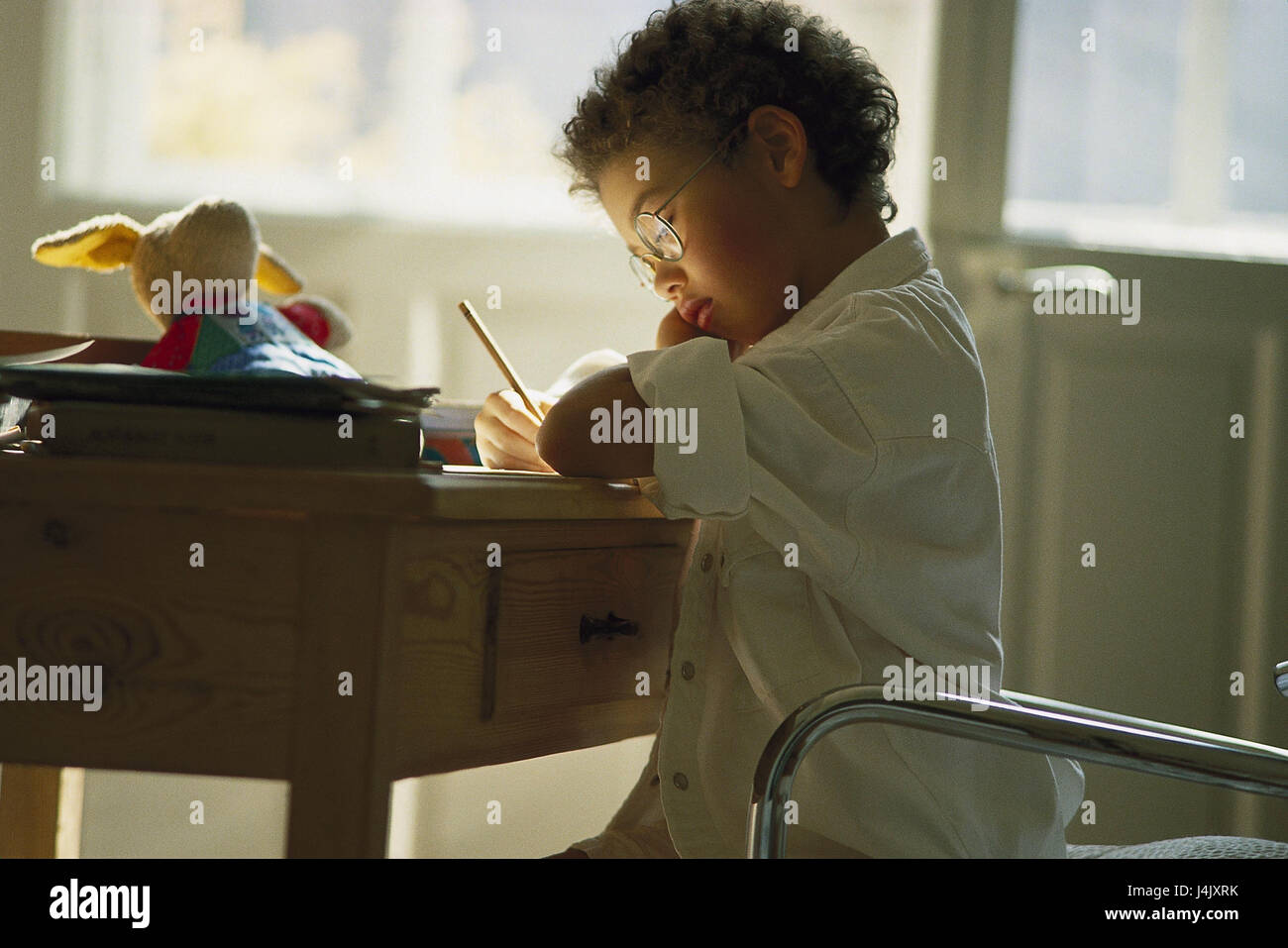 Children's rooms, girls, swarthy, glasses, homework, write inside, at home, child, blond, long-haired, learn, schoolgirl, school child, school assignments, house practise, assignment Stock Photo