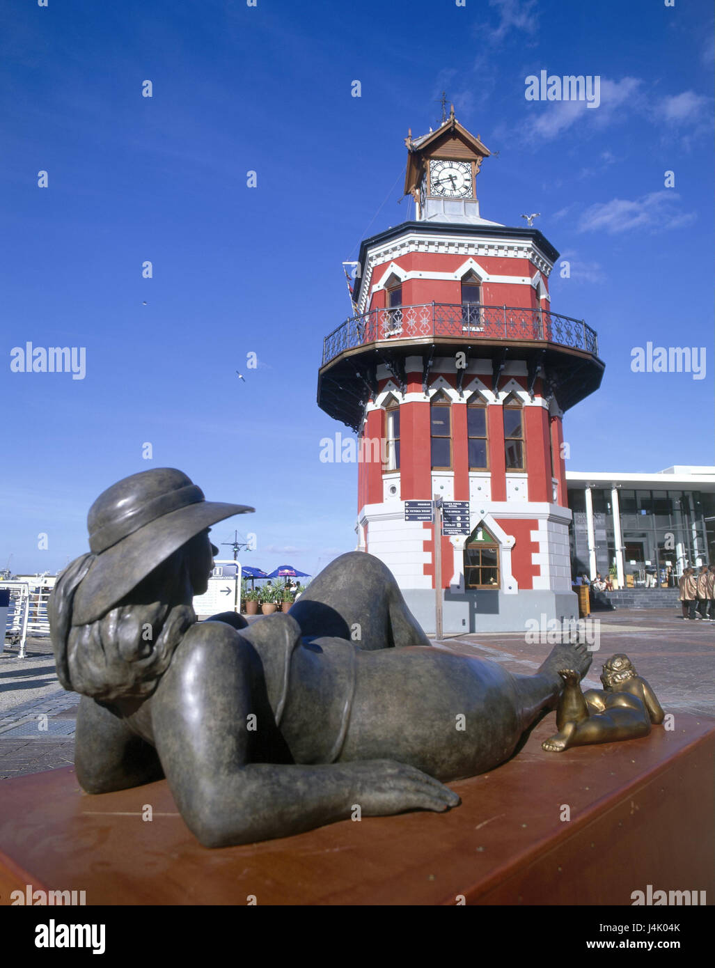South Africa, Capetown, Victoria & Alfred Waterfront, Quay 4, bell tower, bronze sculpture western cape, the Cape Province, Kaapstad, province west cape, Victoria and Alfred Waterfront, statue, sculptures, tower, red, building, structure, architecture, place of interest, culture Stock Photo