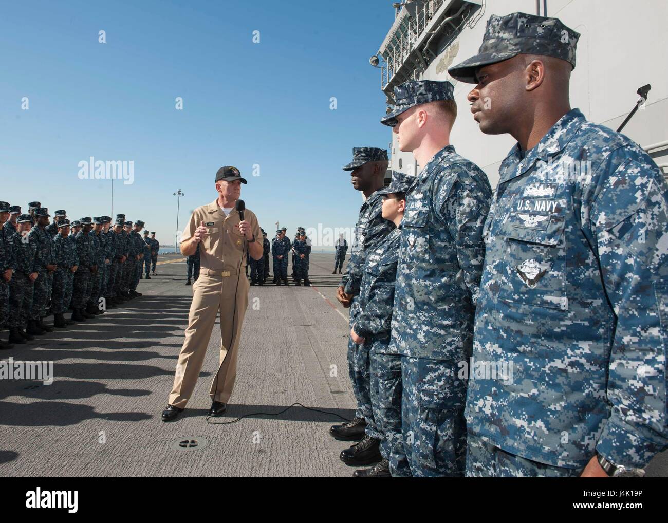161110-N-FG333-008 SAN DIEGO (Nov. 10, 2016) Master Chief Petty Officer of the Navy (MCPON) Steven Giordano addresses amphibious assault ship USS Boxer (LHD 4) Sailors of the Year during an all hands call. Boxer is currently pier side preparing for a planned maintenance availability. (U.S. Navy photo by Seaman David Ortiz/Released) Stock Photo