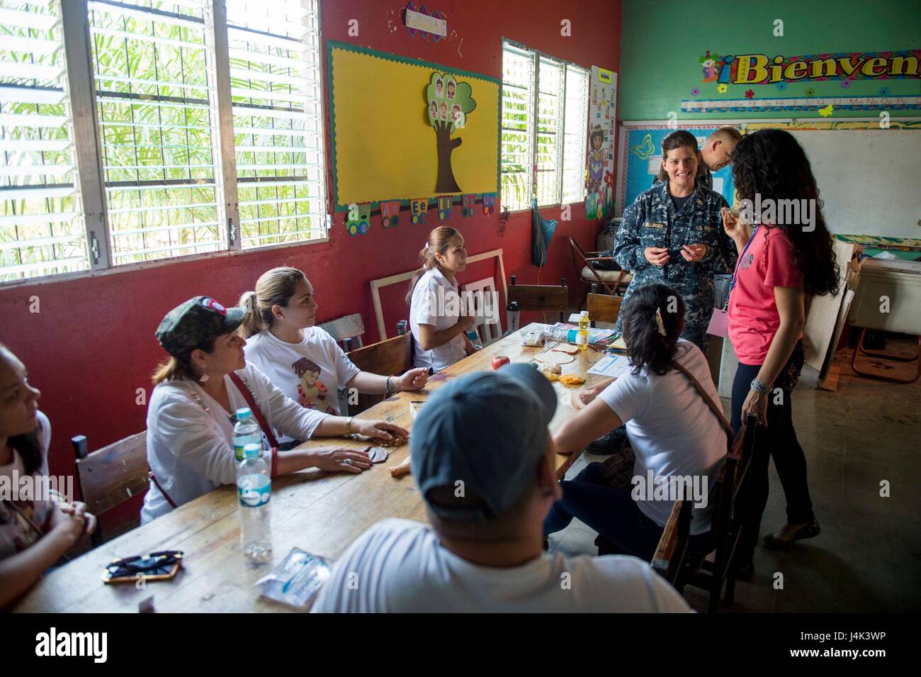 170225-N-YL073-638 TRUJILLO, Honduras (Feb. 27, 2017) – Cmdr. Jennifer Wallinger, a dietitian and native of Carmel, N.Y., assigned to Naval Hospital Jacksonville, Fla., conducts a basic nutrition class for host nation residents at the Continuing Promise 2017 (CP-17) medical site in support of CP-17's visit to Trujillo, Honduras. CP-17 is a U.S. Southern Command-sponsored and U.S. Naval Forces Southern Command/U.S. 4th Fleet-conducted deployment to conduct civil-military operations including humanitarian assistance, training engagements, and medical, dental, and veterinary support in an effort  Stock Photo