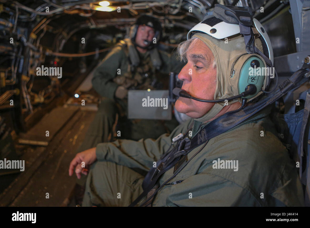 Jay Leno, television host for “Jay Leno’s Garage,” flies on an MV-22B Osprey during his visit to Marine Corps Air Station Camp Pendleton, Calif., March 3. Leno accompanied Marine Medium Tiltrotor Squadron 164 on an overall mission, including flight maneuvers and tailgunnery training. (U.S. Marine Corps photo by Lance Cpl. Jake M. T. McClung) Stock Photo