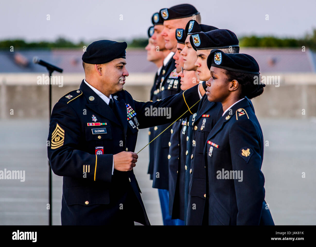 (FORT BELVOIR, Va. (May 04, 2017)--Hundreds of service members at Fort Belvoir Community Hospital gathered before daybreak and celebrated their unique service cultures and bonds as one of the only two joint military medical facilities in the U.S. during a spring formation and uniform transition ceremony May 4, 2017.     A naval tradition since 1817, the formation ceremony signifies the change from fall/winter to spring/summer attire. In a show of solidarity and camaraderie, the U.S. Army, Navy, Air Force and Public Health Service participated in the event as a show of support and to reaffirm t Stock Photo