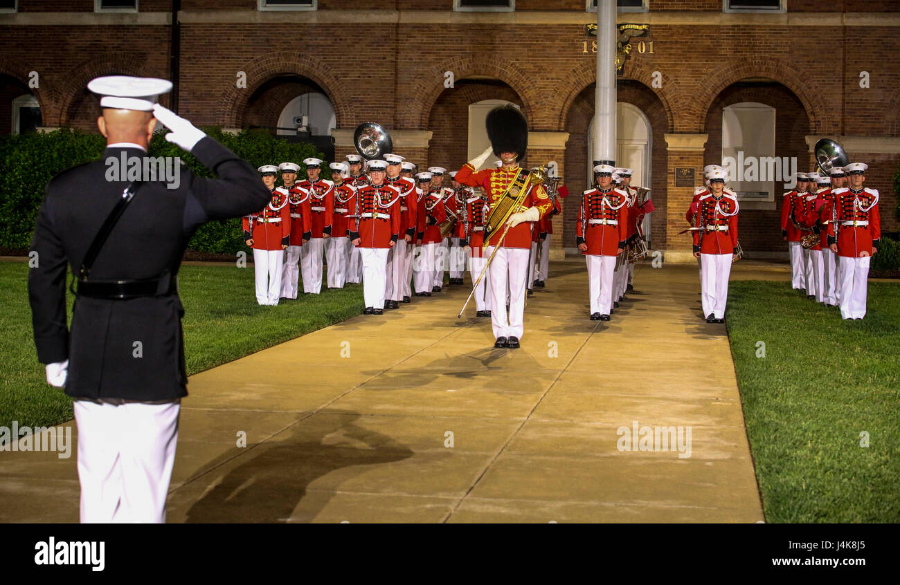 Master Sgt. Duane King, drum major, “The President’s Own” U.S. Marine Corps Band, salutes the Executive Officer, Marine Barracks Washington D.C., Lt. Col. Matthew McKinney, during a Friday Evening Parade at the Barracks, May 5, 2017. The guests of honor for the parade were the Honorable Paul Cook, California’s 8th Congressional District Congressman, the Honorable Jack Bergman, Michigan’s 1st Congressional District Congressman, and the Honorable Salud Carbajal, California’s 24th Congressional District Congressman. The hosting official was Gen. Glenn Walters, assistant commandant of the Marine C Stock Photo