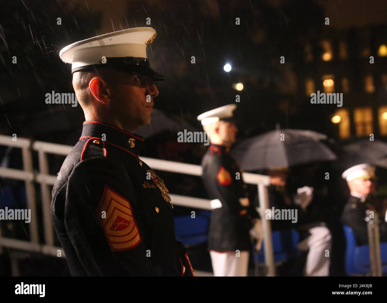 Master Sgt. Hector Vicente, parade staff senior, stands at ceremonial position during a Friday Evening Parade at Marine Barracks Washington D.C., May 5, 2017. The guests of honor for the parade were the Honorable Paul Cook, California’s 8th Congressional District Congressman, the Honorable Jack Bergman, Michigan’s 1st Congressional District Congressman, and the Honorable Salud Carbajal, California’s 24th Congressional District Congressman. The hosting official was Gen. Glenn Walters, assistant commandant of the Marine Corps.(Official Marine Corps photo by Lance Cpl. Damon Mclean/Released) Stock Photo