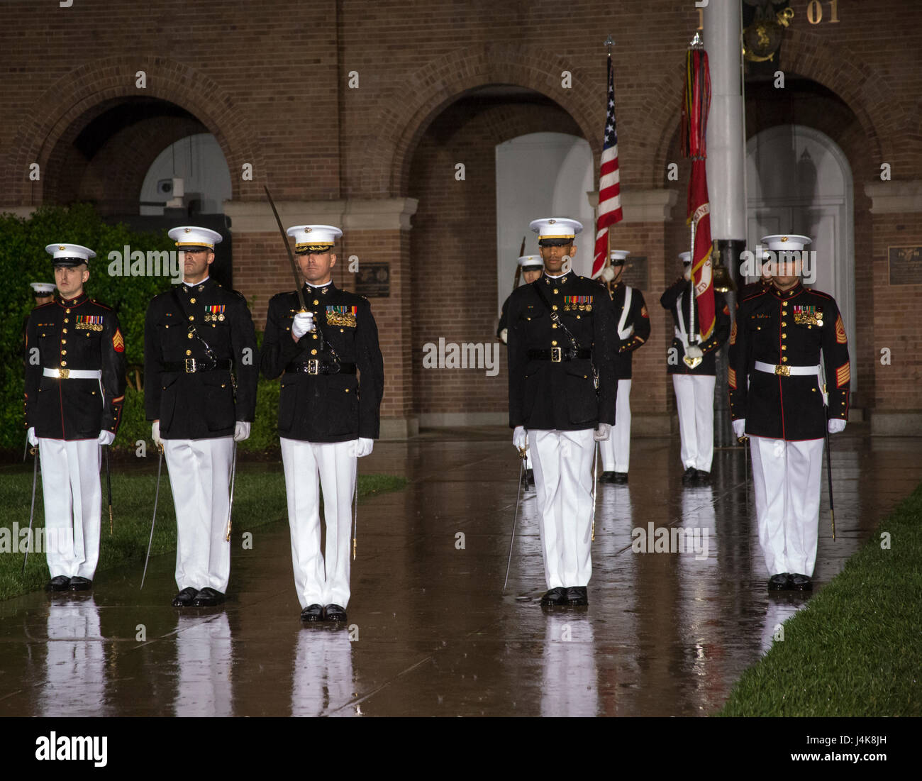 The Parade Staff performs during a Friday Evening Parade at Marine Barracks Washington D.C., May 5, 2017. The guests of honor for the parade were the Honorable Paul Cook, California’s 8th Congressional District Congressman, the Honorable Jack Bergman, Michigan’s 1st Congressional District Congressman, and the Honorable Salud Carbajal, California’s 24th Congressional District Congressman. The hosting official was Gen. Glenn Walters, assistant commandant of the Marine Corps. (Official Marine Corps photo by Cpl. Robert Knapp/Released) Stock Photo