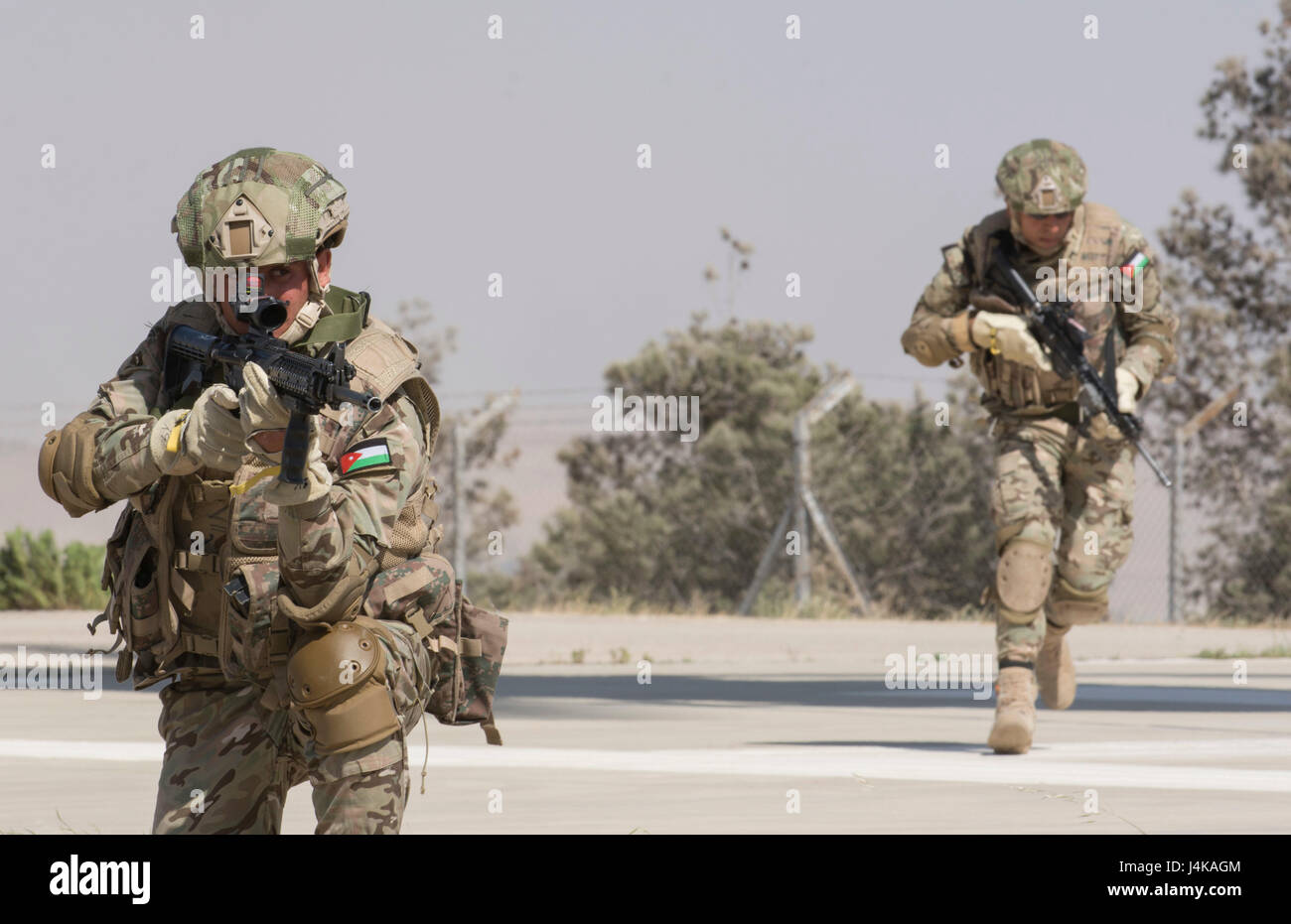 Members of the Jordanian Special Operations secure a landing pad during ...