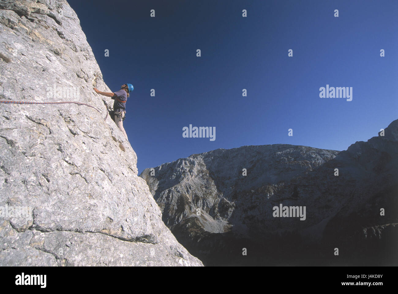 Germany, Bavaria, Ammergauer alps, hostage's stone, 1884 m, climbers alps, mountains, mountains, mountainous region, cliff face, mountaineer, climbing rope, helmet, alpine climbing, alpinism, climbing, mountain sport, Outdoorsport, sport, hobby, leisure time sport Stock Photo