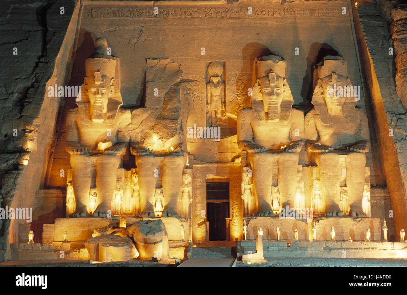 Egypt, Nubia, temple of Abu Simbel, input, illuminateds outside, Africa, East, portal, statues, giant statues, king Ramses II, place of interest, UNESCO-world cultural heritage, dusk, evening light, evening, lighting, Illumination, illuminated Stock Photo