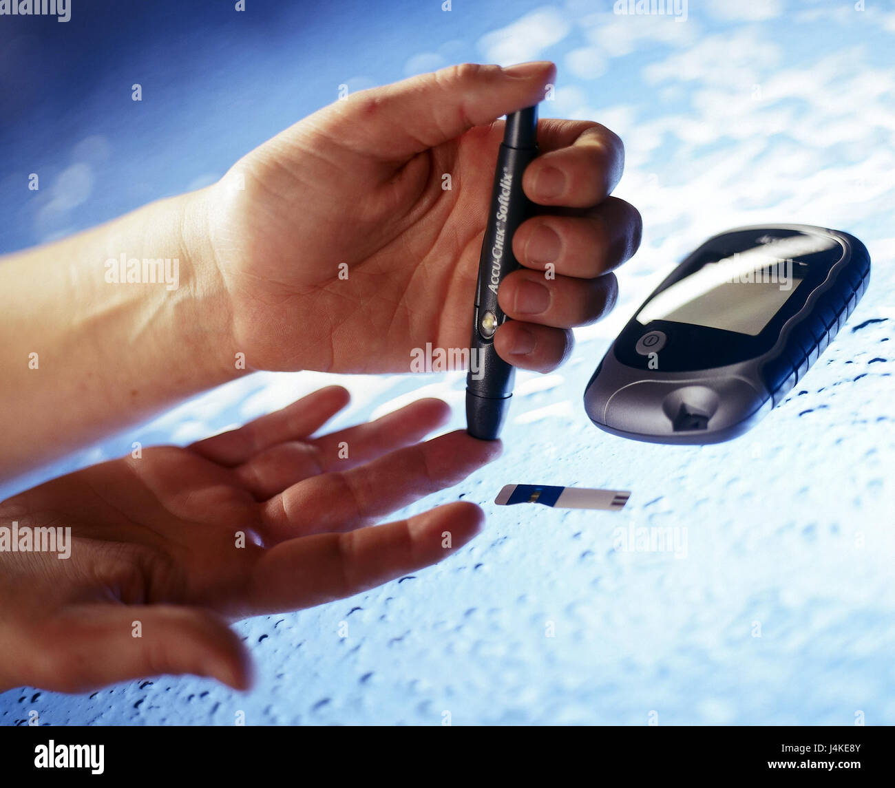 Hands, blood glucose measurement, measuring instrument diabetes ...
