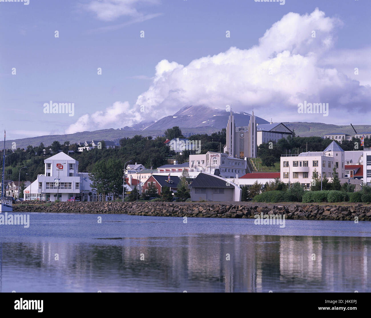 Iceland, Akureyri, town view, church Europe, island, Iceland, Nordisland, the north, town, parish church, harbour basin, monument, statue, place of interest Stock Photo