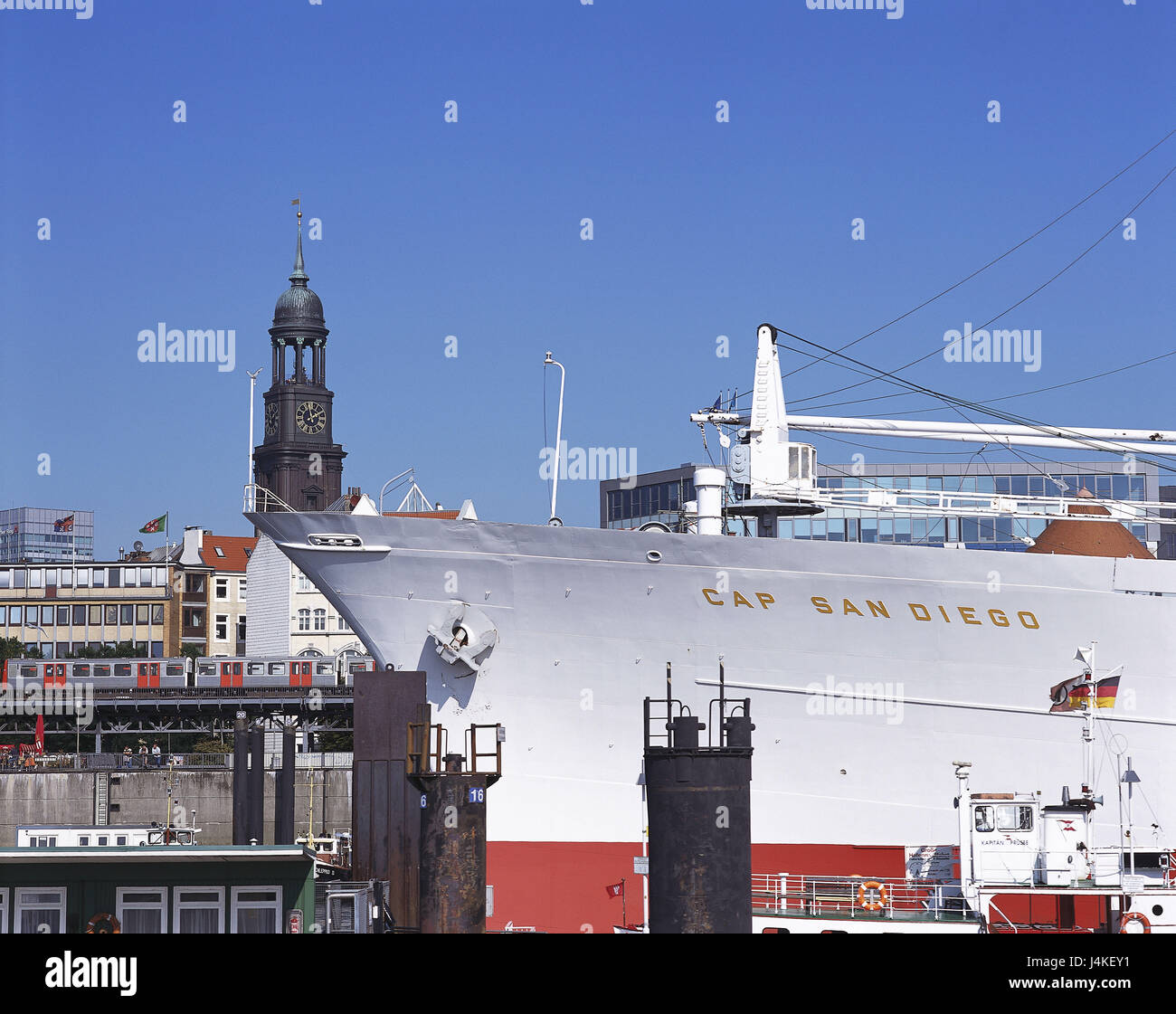 Germany, Hamburg, harbour, ship 'Cap San Diego', detail Europe, Hanseatic town, Saint Pauli, landing stages, the Elbe, museum ship, ship, general cargo freighter, restores, label, stroke, ship name, side board, side wall, navigation, place of interest, background, steeple, St. Michaelis, Michel, landmark Stock Photo