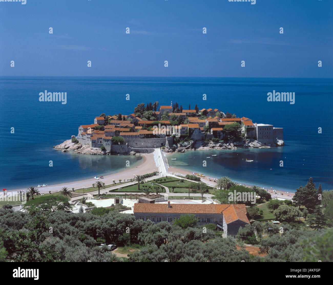 Montenegro, island Sveti Stefan, island view, Adriatic, connection embankment, mainland Europe, Adriatic Coast, sea, the Mediterranean Sea, the Adriatic Sea, houses, residential houses, coast, bile coast, embankment, beach, destination, width, distance, horizon Stock Photo