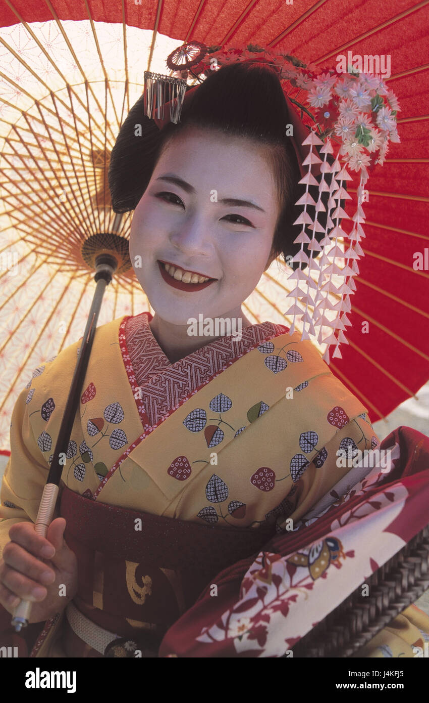 Japan, Kyoto, Maiko girls, smile, display screen, portrait no model release! Asia, Eastern Asia, island state, Nippon, Nihon Koku, Honshu, Asian, woman, professional training, education, geisha, clothes, kimono, traditionally, tradition, ethnically, folklore, make-up, greasepaint, made up, occupation, career plans, women's portrait, hair ornament Stock Photo