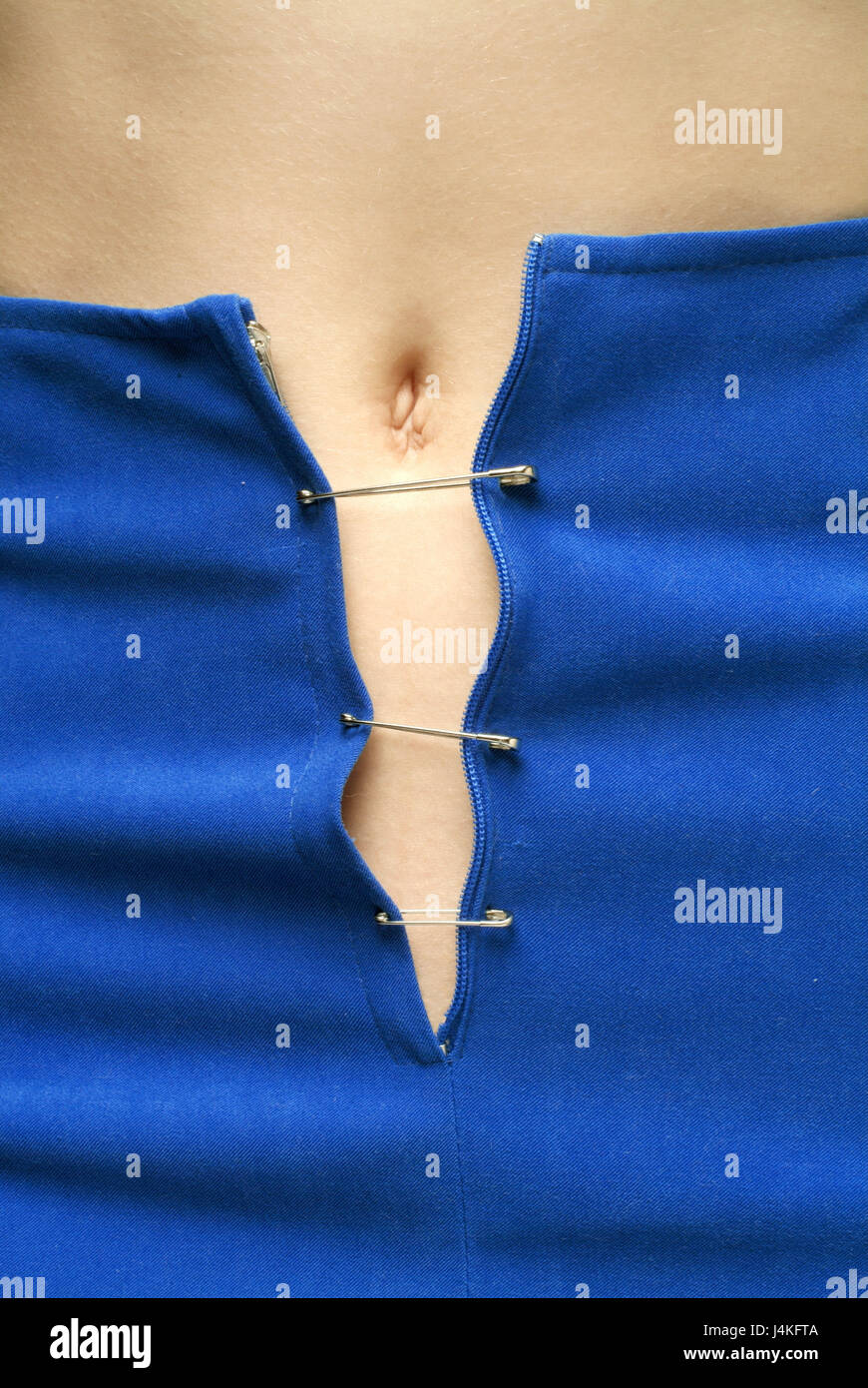 https://c8.alamy.com/comp/J4KFTA/woman-rock-broken-zipper-safety-pins-close-up-abdomen-belly-button-J4KFTA.jpg