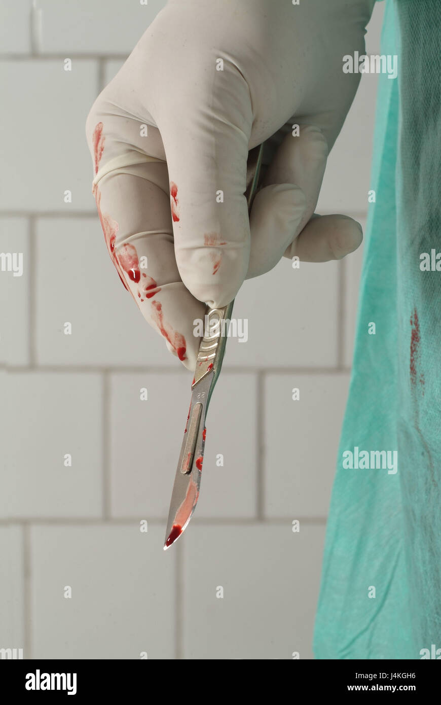 Surgeon, op. clothes, detail, hand, scalpel, bloody Ti7, hospital