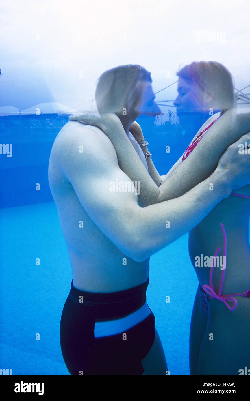 Pool Couple Embrace Under Water About Water Blur At The Side Young Swimwear Swimming Trunks Bikini Have A Bath Together Love Falls In Love Affection Hold On Embrace Vacation Leisure Time Summer