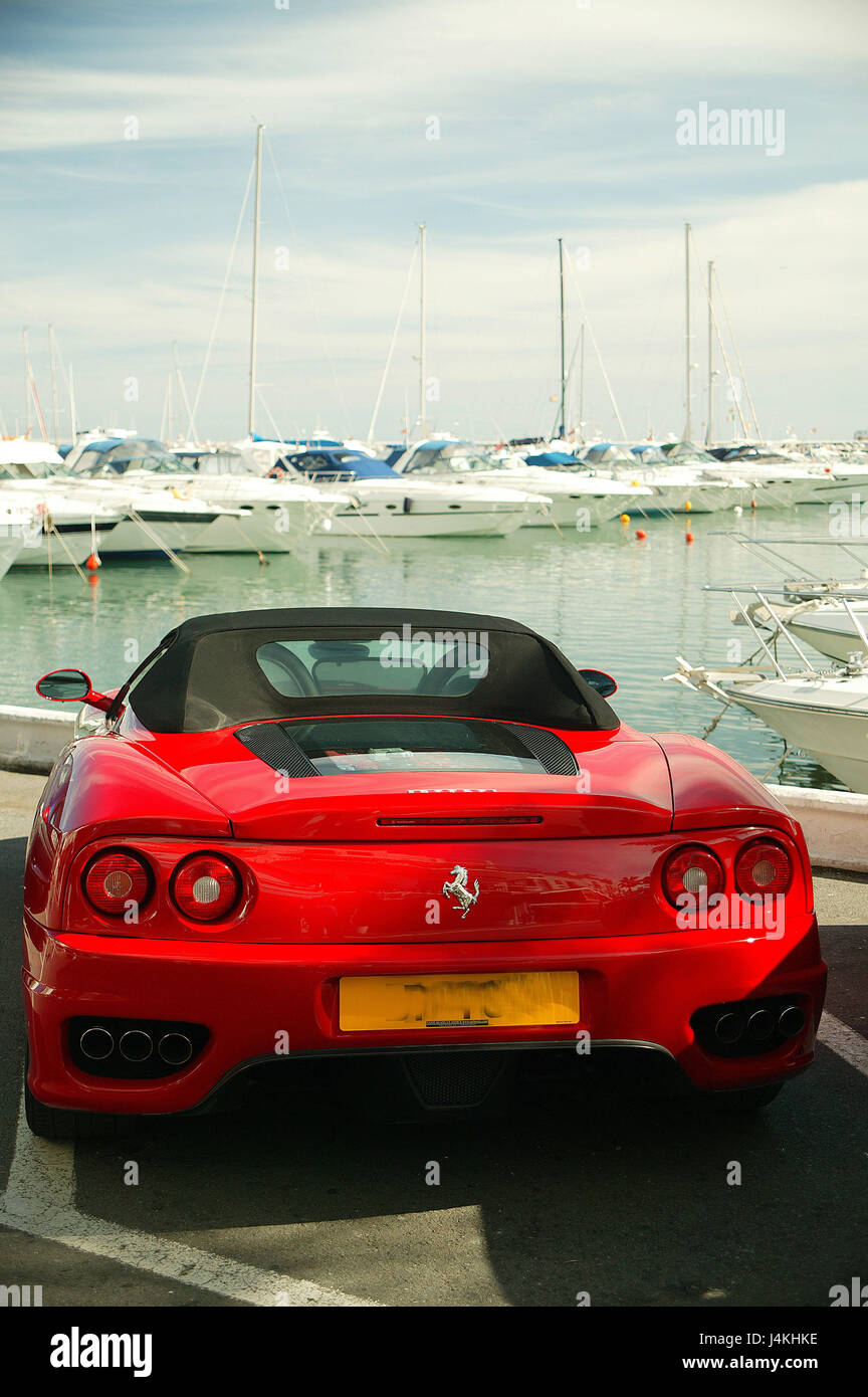 Spain, Andalusia, Costa del Sol, Marbella, Puerto Banus, yacht harbour,  parking lot, Ferrari, rear view Europe, province Malaga, town, seaside  resort, harbour, jetty, boats, ships, car, vehicle, luxury car, red, sports  cars,