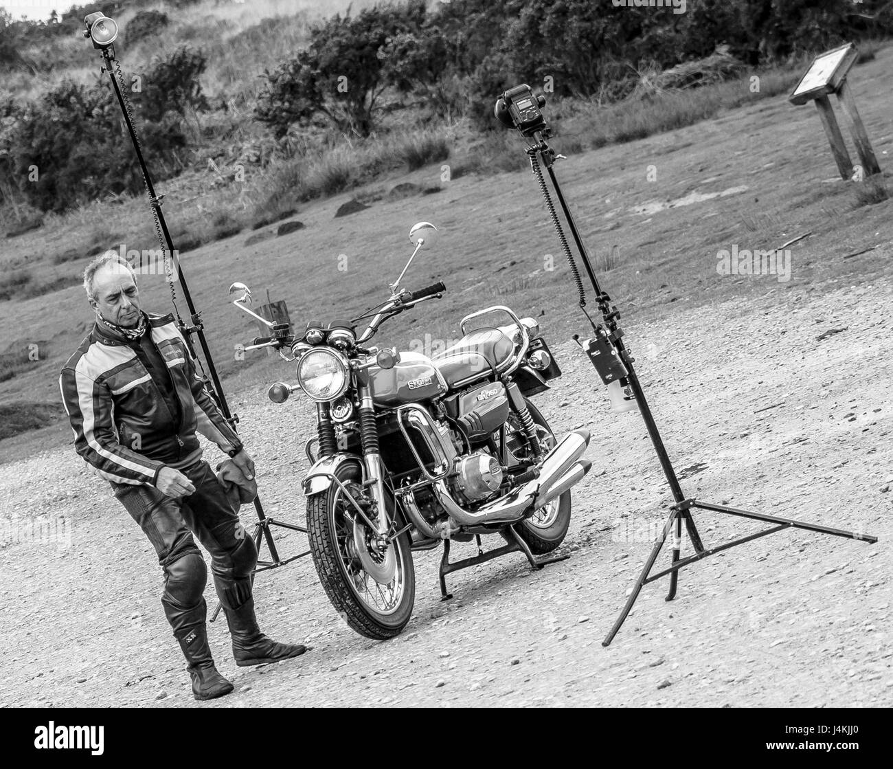 Suzuki being photographed in public car park Stock Photo