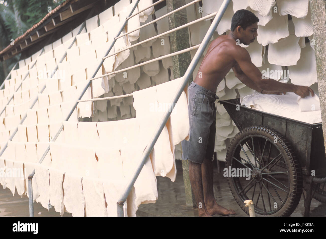 Sri Lanka, Hikkaduwa, elastic production, man, India rubber disks, dry