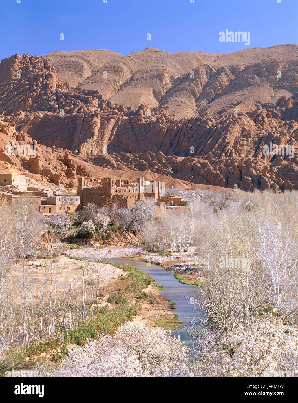 Morocco, atlas mountains, high atlas, Dades valley, kasbah Africa, mountain landscape, the Atlas Mountains, rock, rock, village, mountain village, houses, mucky construction method, mucky houses, river, waters, vegetation Stock Photo