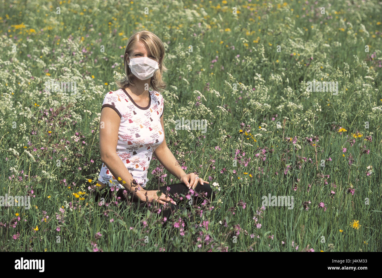 Flower meadow, woman, young, pollinosises, respiration protection, view ...