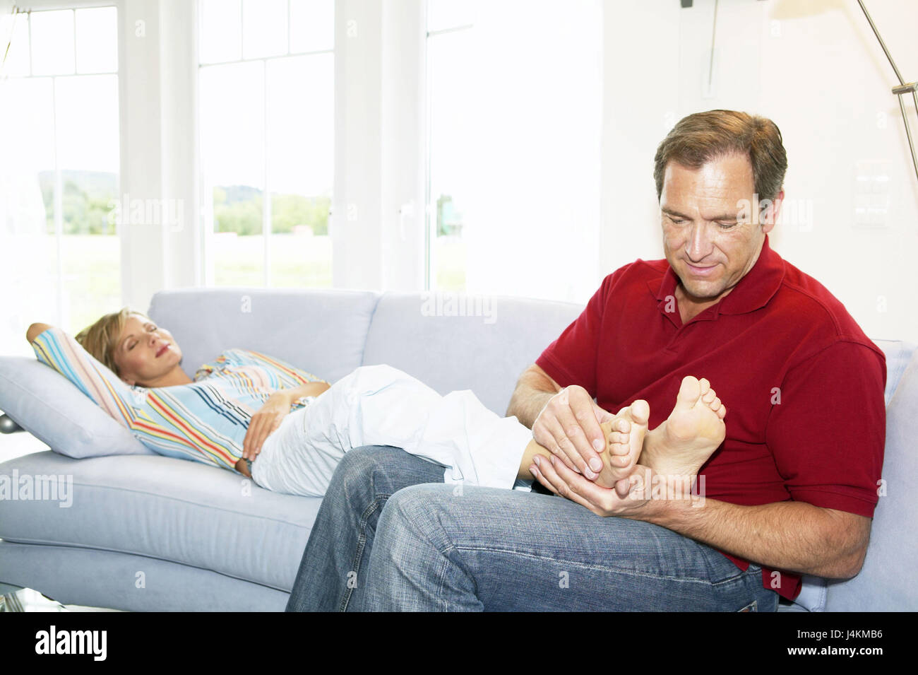 Foot massage couple hi-res stock photography and images