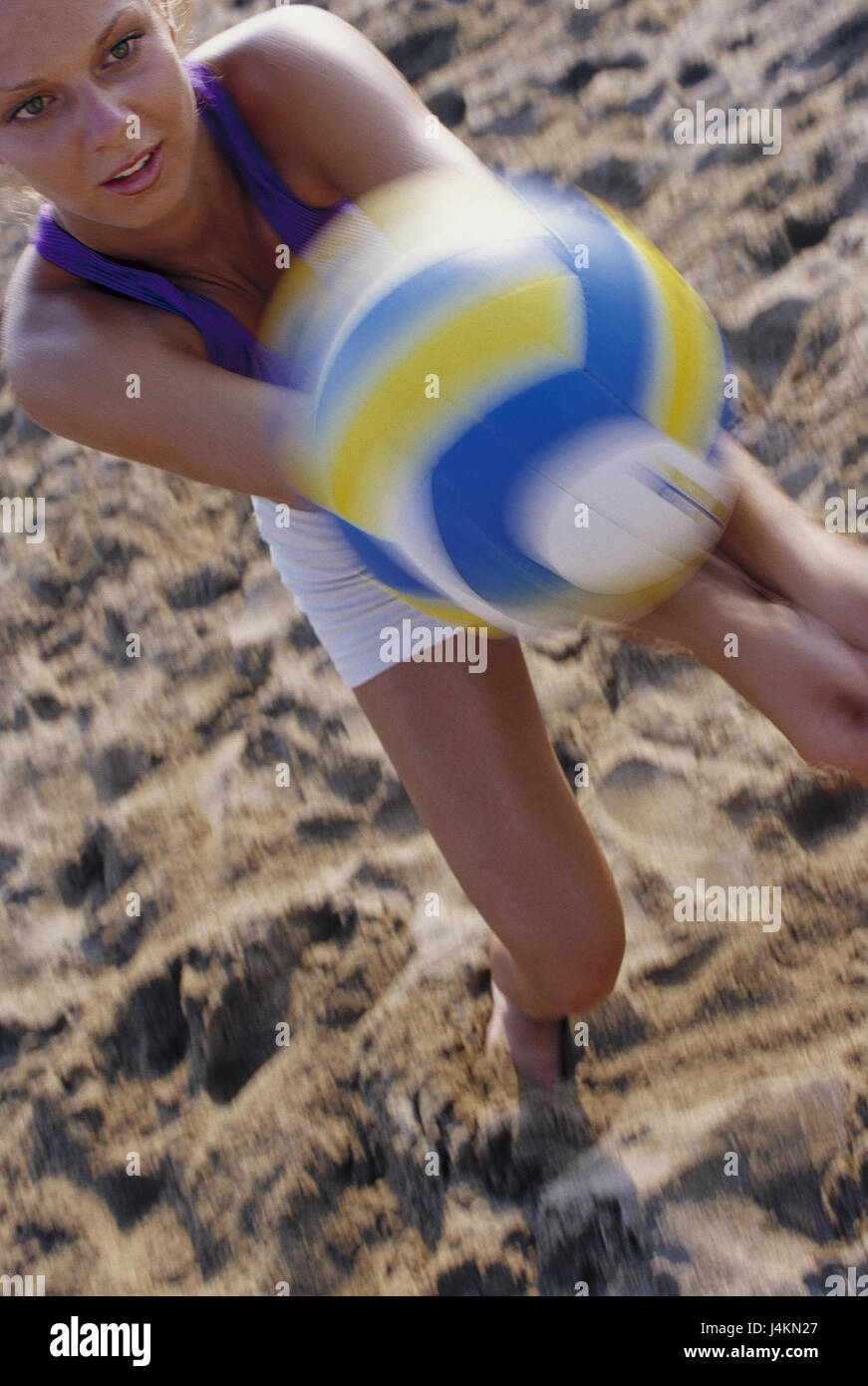 Beach, woman, volleyball, ball, accept, blur sandy beach, summer, vacation, leisure time, lifestyle, young, sport, sportily, actively, activity, game, volleyball, Beachvolleyball, fitness, fit, motion, excavate Stock Photo