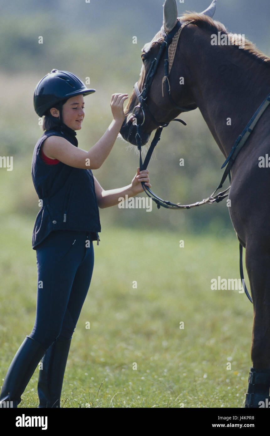 Girls, horse, tacked up, stroke meadow, holidays, leisure time, bleed holidays, rider, teenager