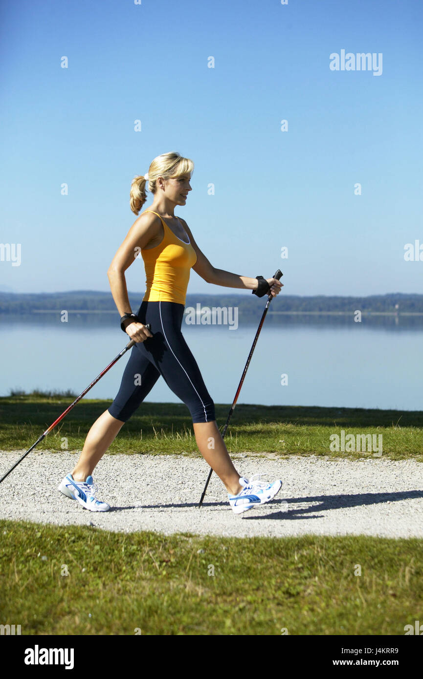 Away, lakesides, woman, sportily, Nordic Walking, at the side 30-40 years,  blond, sports clothes, sportswear, telescope floors, floors, run, go, run  technology, rest, equaliser, bold burn, sport, fun, sport, activity,  actively, fitness,