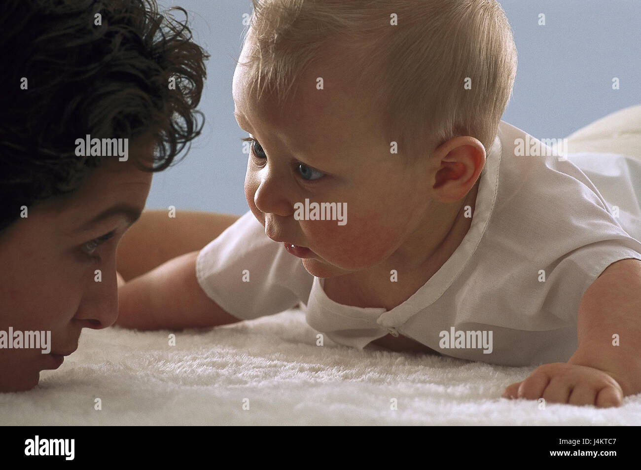 Mother, baby, eye contact, portrait, detail inside, at home, woman