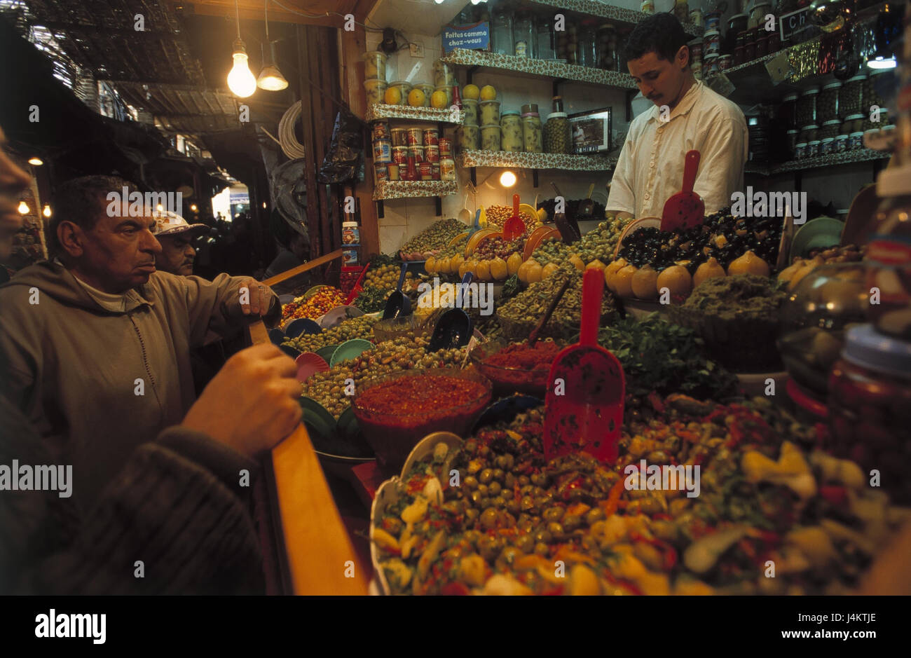 Morocco, fez, Souk, market, man, sales, foods, specialities no model release, Africa, city wall, defensive wall, weekly market, sell, makes purchases, economy, food, food, olives, marinaded, trade, retail trade, business, loading, customer, men, locals Stock Photo