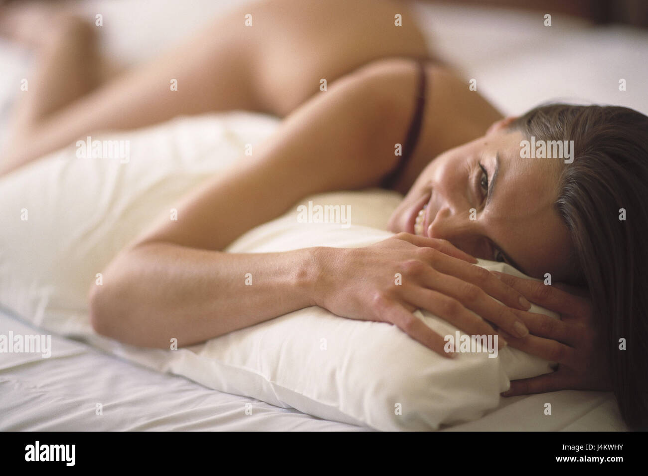 Woman, happily, bed, there lie bedrooms, single, rest, recover, are relaxing, take it easy, leisure time, week-end, enjoy, are lazy, get a good night's sleep, lifestyle Stock Photo