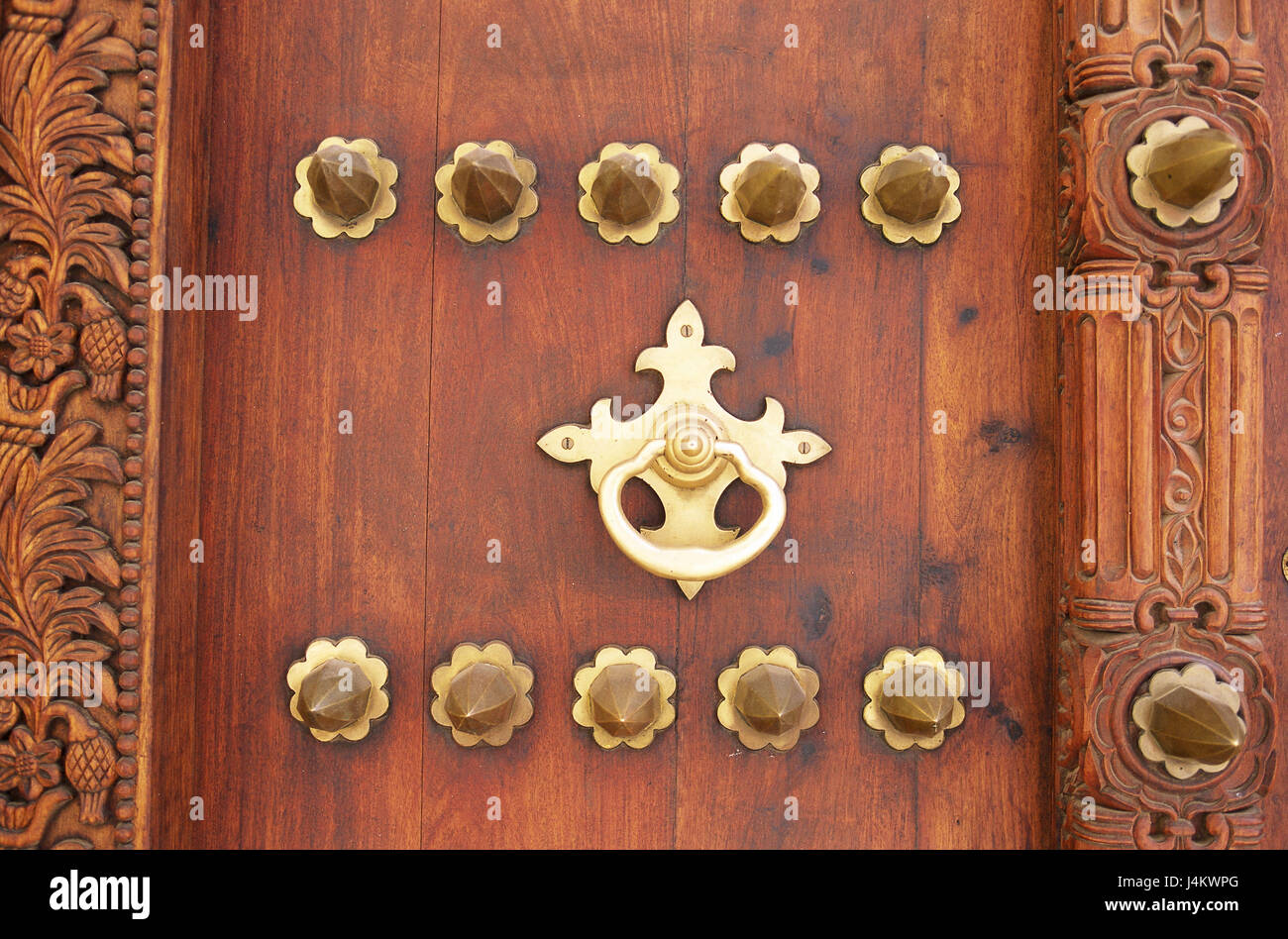 Decorated wooden door in a house in Stone Town, Stone Town, Zanzibar City