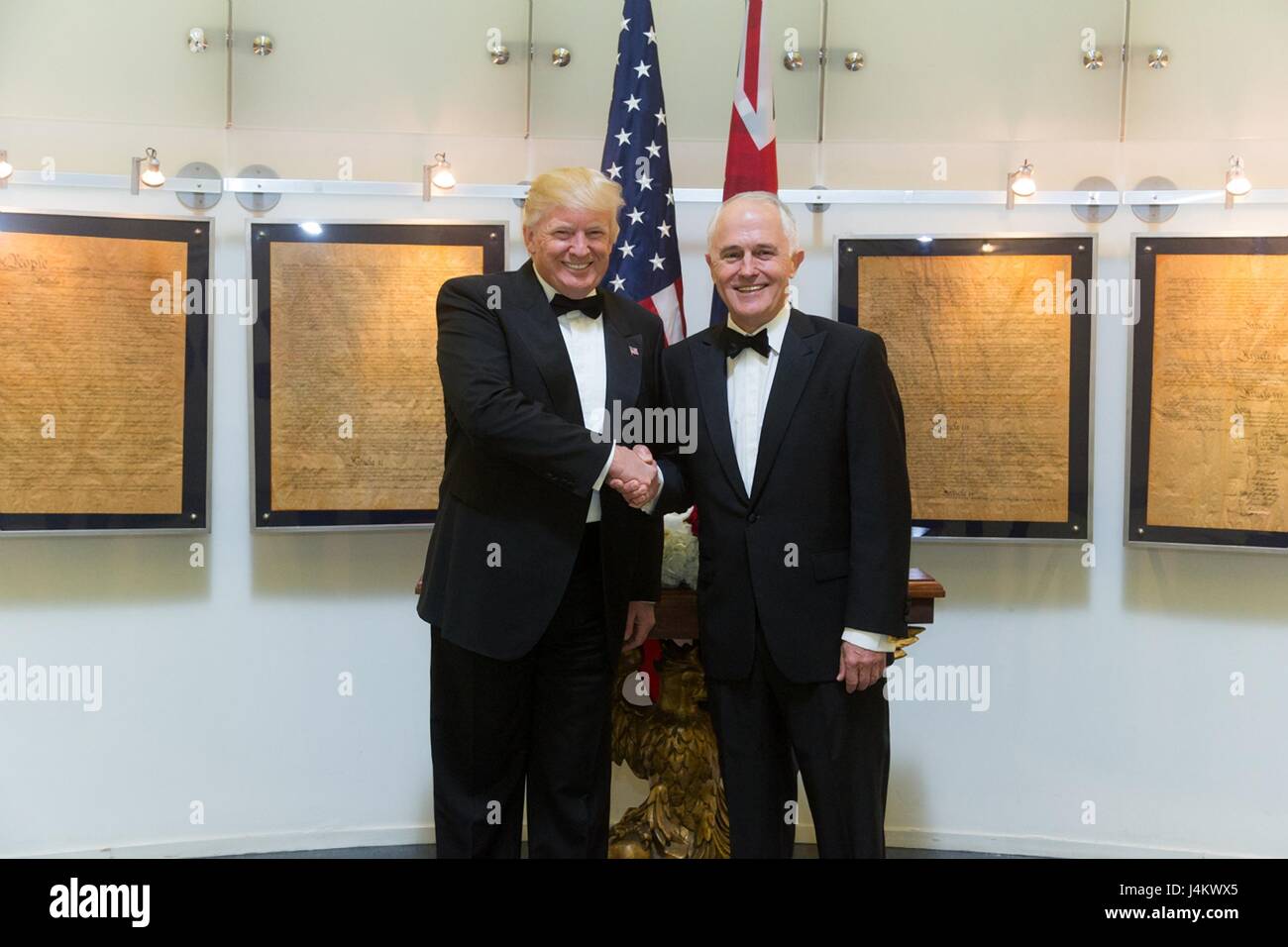 U.S. President Donald Trump greets Australian Prime Minister Malcom Turnbull before a bilateral meeting aboard the Intrepid Sea, Air & Space Museum May 4, 2017 in New York City. The two leaders attended a dinner to honor the 75th anniversary of the victory of the United States and Australia over Japan in the Battle of the Coral Sea during World War II. Stock Photo
