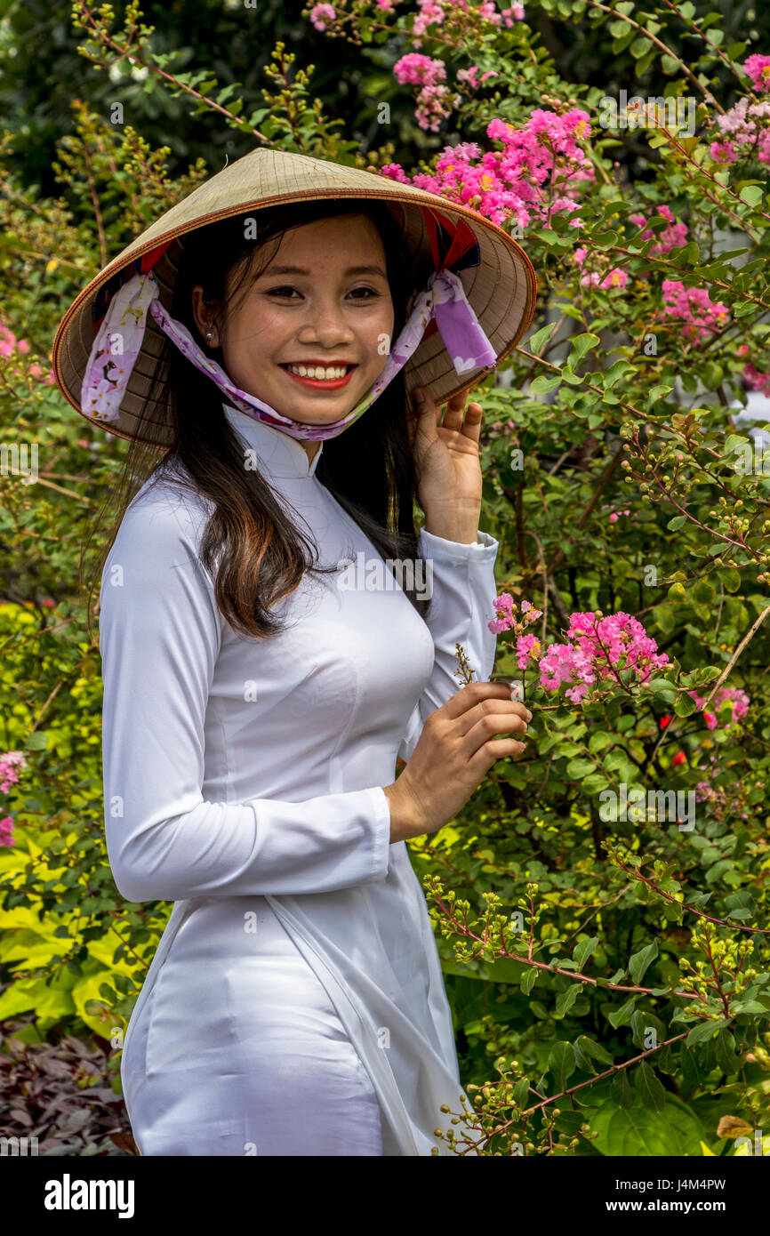Girl in Ao Dai traditional vietnamese robe for females Ho Chi Minh (Saigon)  Vietnam Stock Photo - Alamy