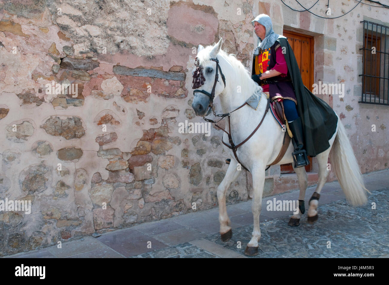 Man wearing medieval clothes and riding a horse. Medieval Days