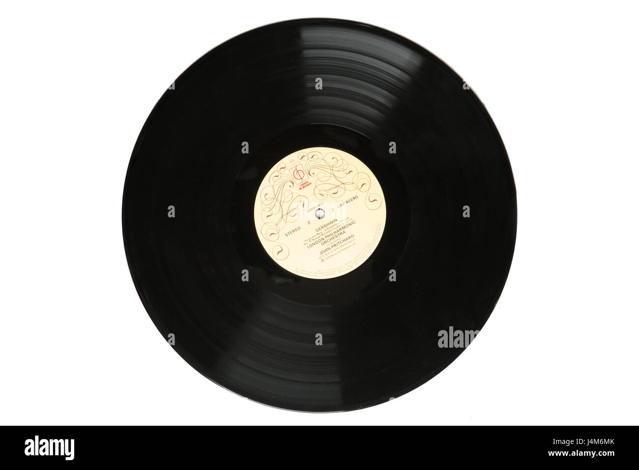 Single black vinyl record photographed in studio Stock Photo