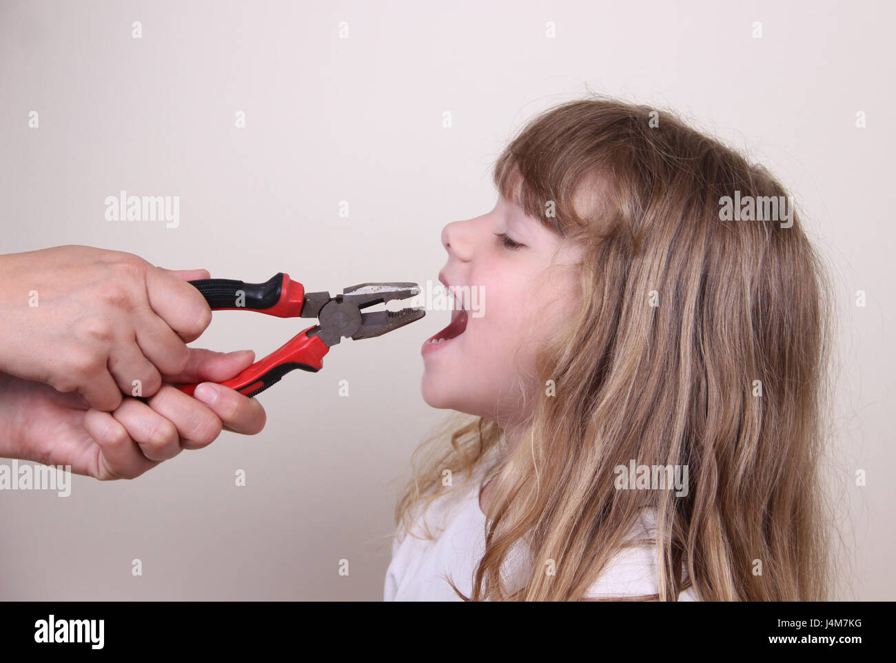 Child tooth extraction hi res stock photography and images alamy