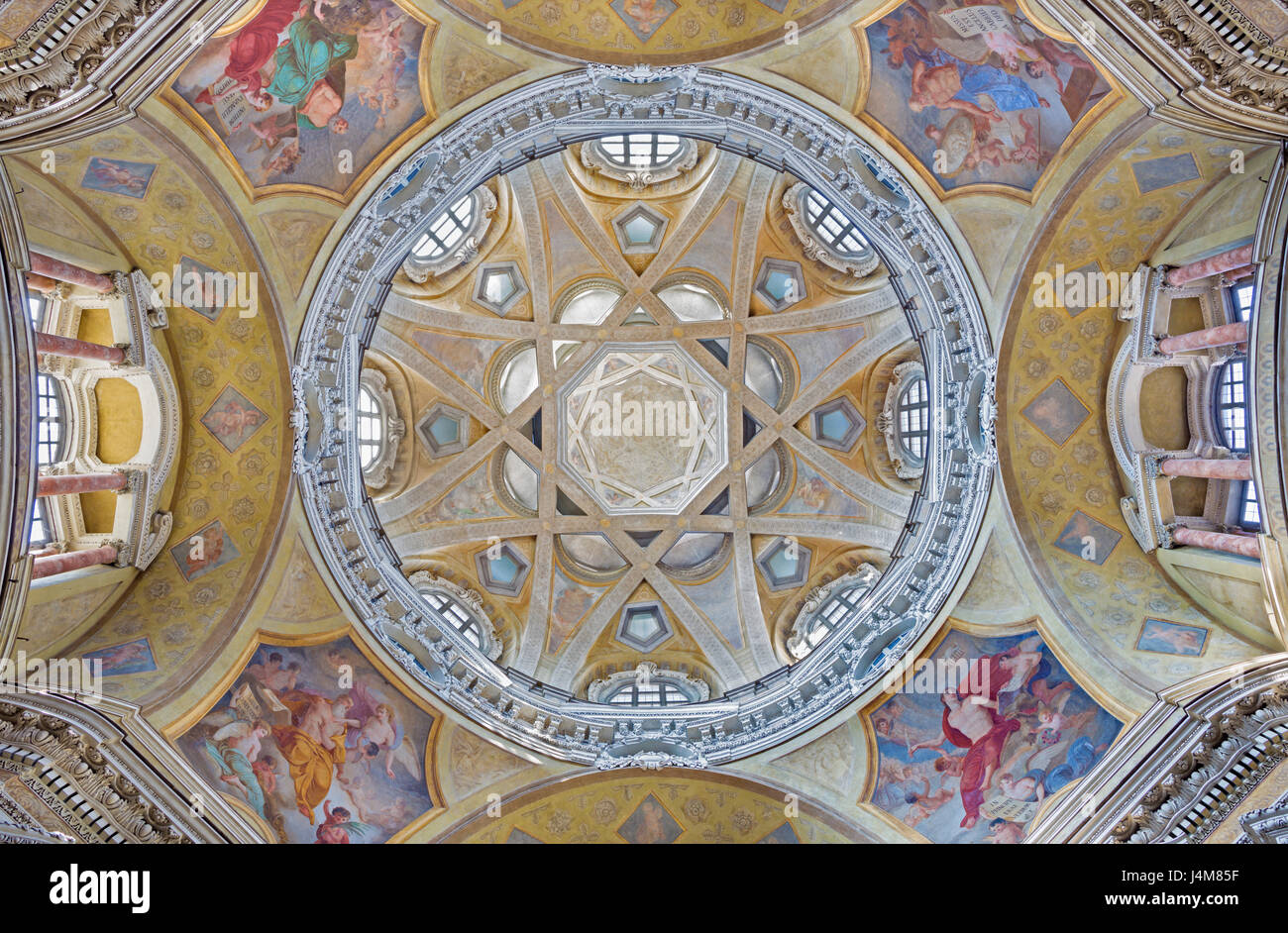 TURIN, ITALY - MARCH 13, 2017: The cupola with the frescoes of the Evangelist in church Chiesa di San Lorenzo by Carlo Felice (1827). Stock Photo