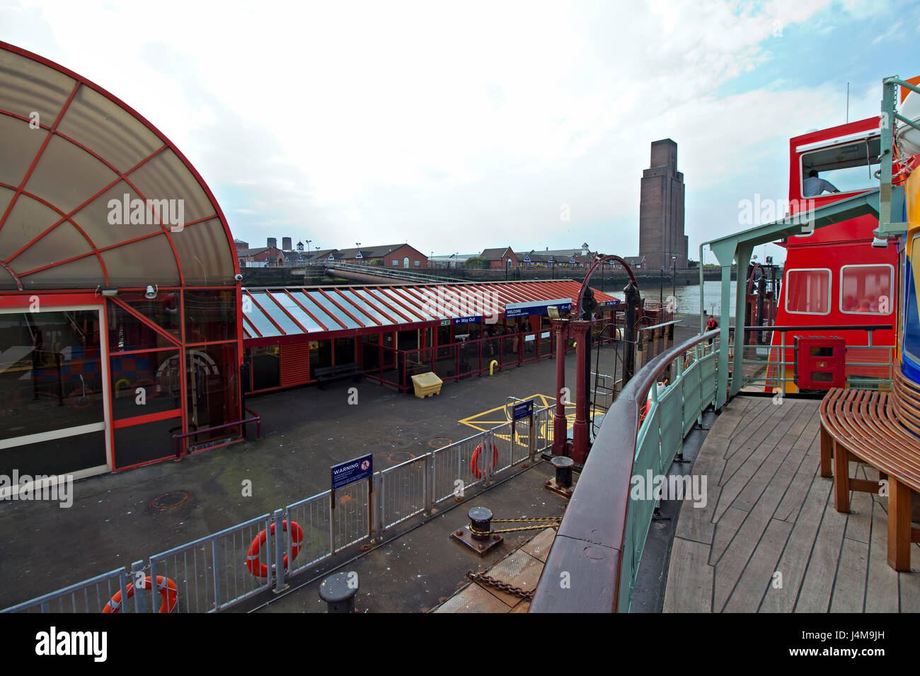 Onboard the Mersey Ferry pulling into Woodside landing stage Birkenhead Stock Photo