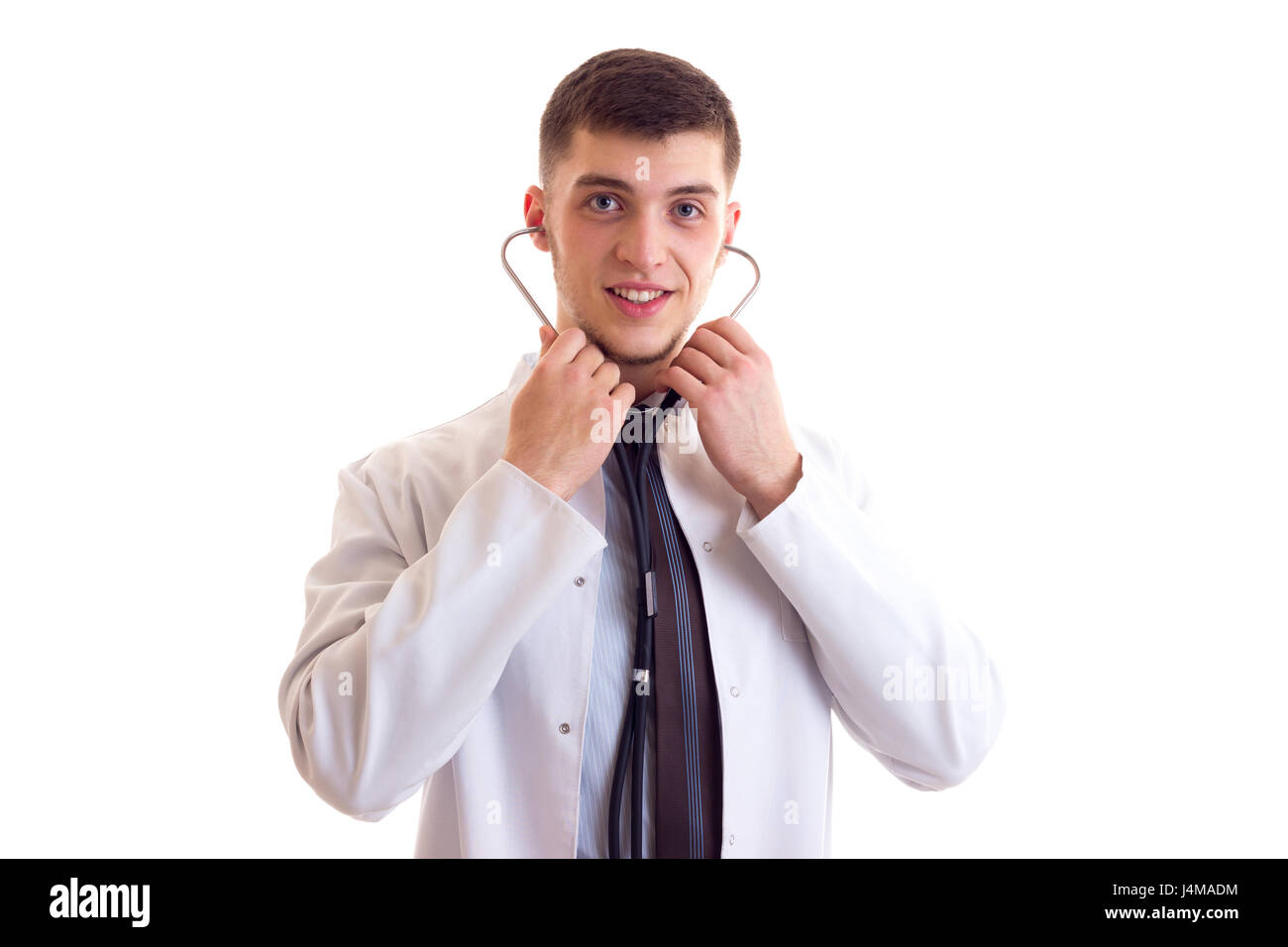 Young man in doctor gown Stock Photo